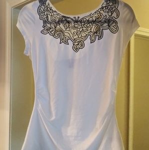 Stretch blouse with decorative flowers